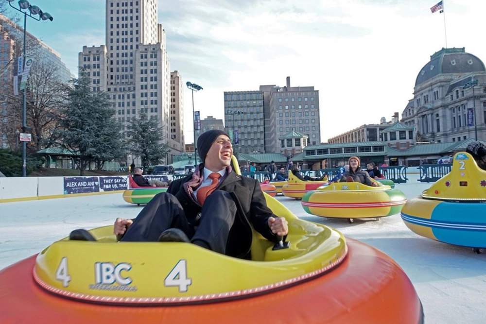 Outdoor games in winter bumper cars on ice