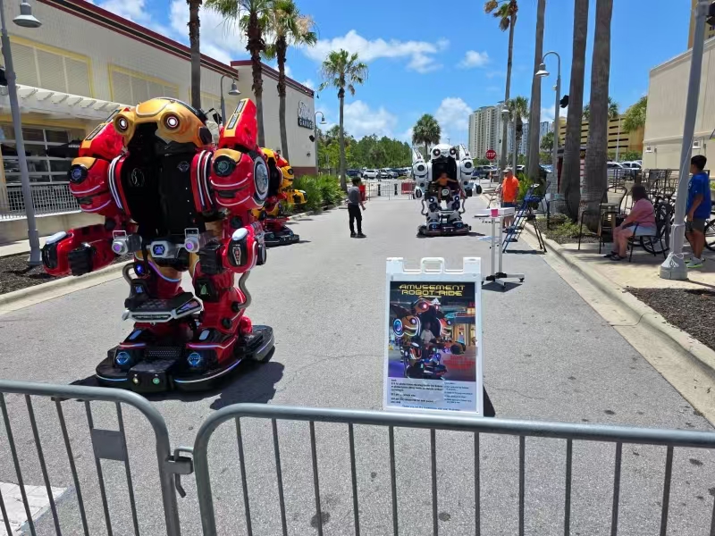 walking robot kiddie ride site in USA