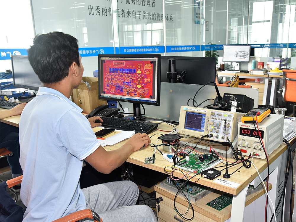 Engineer Testing Amusement Product Circuit Board